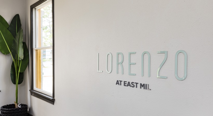 the logo for lorenzo is displayed on the wall at The Lorenzo